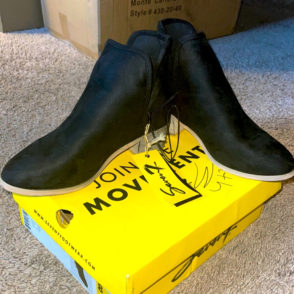 Women’s size 8 Black ankle boots. Brand new with tags. Great fit fit boot lovers